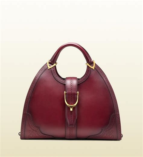 gucci stirrup bag burgundy|Gucci handbags.